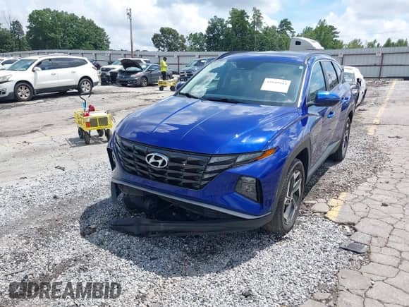 2023 Hyundai Tucson SEL z VIN 5NMJFCAE4PH196713, wystawiony jako IAAI lot #42949944 z przebiegiem 22 921 mil mil oraz . Historia ofert i sprzedaży dostępna na DreamBid. Obrazek 2.