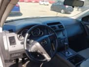 ✅ 2015 Mazda CX-9 Touring • VIN: JM3TB3CV1F0461403 • Lot: 42148325. Listed on IAAI with 143,452 mi. Free auction sales archive from the USA and detailed vehicle history report at DreamBid. Image 17.