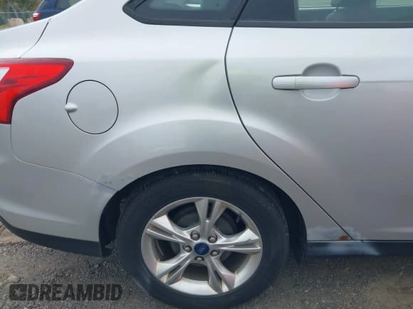 ✅ 2014 Ford Focus SE • VIN: 1FADP3F23EL248911 • Lot: 43486723. Listed on IAAI with 133,164 mi. Free auction sales archive from the USA and detailed vehicle history report at DreamBid. Image 13.
