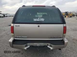 2003 Chevrolet Blazer LS z VIN 1GNCS13X53K148585, wystawiony jako Copart lot #82339174 z przebiegiem 262 249 mil mil oraz Szkoda całkowita • Salvage title. Historia ofert i sprzedaży dostępna na DreamBid. Obrazek 6.