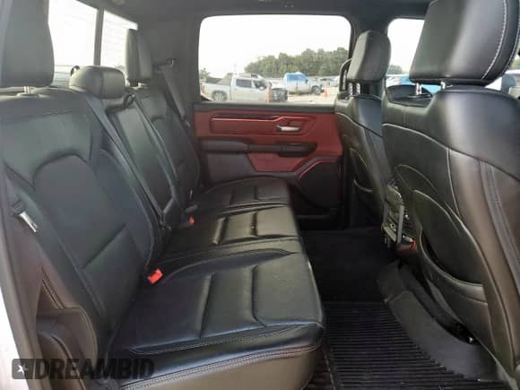 2020 Ram 1500 Rebel z VIN 1C6SRFLM1LN231228, wystawiony jako Copart lot #58342265 z przebiegiem 133 097 mil mil oraz Czysty tytuł • Clean title. Historia ofert i sprzedaży dostępna na DreamBid. Obrazek 10.