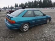 ✅ 1995 Ford Escort • VIN: 1FASP1284SW307142 • Lot: 88531955. Wystawiony na Copart z przebiegiem 93 323 mil. Bezpłatny archiwum sprzedaży aukcyjnych z USA i szczegółowy raport historii pojazdu na DreamBid. Zdjęcie 3.