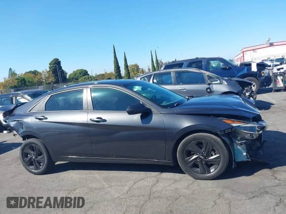 2021 Hyundai Elantra SEL z VIN 5NPLM4AG0MH052984, wystawiony jako IAAI lot #43313010 z przebiegiem 92 117 mil mil oraz . Historia ofert i sprzedaży dostępna na DreamBid. Obrazek 14.