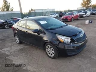 ✅ 2014 Kia Rio LX • VIN: KNADM4A30E6385633 • Lot: 43697469. Wystawiony na IAAI z przebiegiem 109 743 mil. Bezpłatny archiwum sprzedaży aukcyjnych z USA i szczegółowy raport historii pojazdu na DreamBid. Zdjęcie 1.