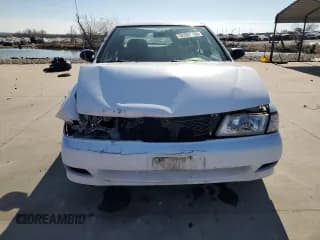 ✅ 1998 Nissan Sentra XE • VIN: 1N4AB41D6WC748529 • Лот: 41982785. Опубликован ранее на Copart с пробегом 122 076 миль. Бесплатный доступ к архиву аукционных продаж из США и подробный отчёт об истории автомобиля на DreamBid. Изображение 5.