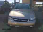 2003 Chevrolet Malibu LS z VIN 1G1NE52J03M720575, wystawiony jako Copart lot #76006164 z przebiegiem 126 282 mil mil oraz Szkoda całkowita • Salvage title. Historia ofert i sprzedaży dostępna na DreamBid. Obrazek 5.