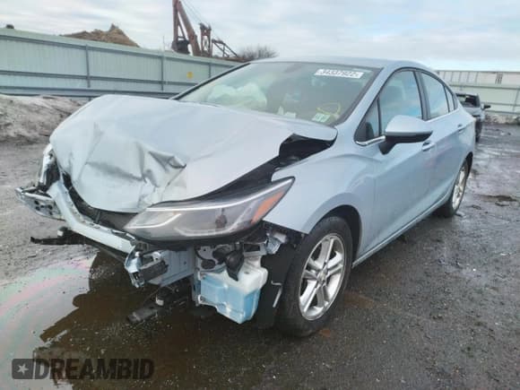 ✅ 2018 Chevrolet Cruze LT • VIN: 1G1BE5SM3J7101896 • Lot: 34337922. Listed on Copart with 52,303 mi. Free auction sales archive from the USA and detailed vehicle history report at DreamBid. Image 2.