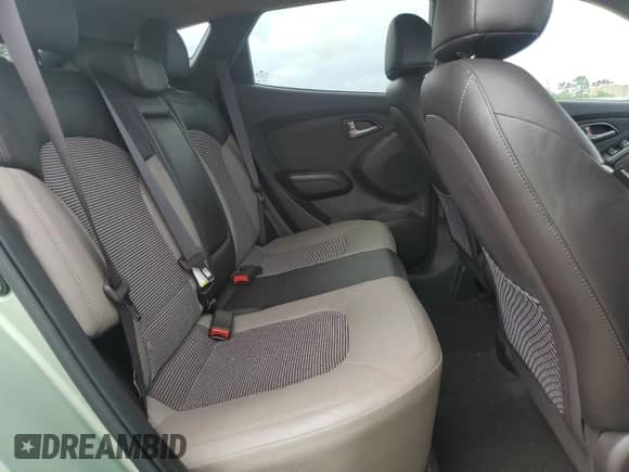 2011 Hyundai Tucson Limited z VIN KM8JU3ACXBU242367, wystawiony jako Copart lot #63461064 z przebiegiem 68 341 mil mil oraz Szkoda całkowita • Salvage title. Historia ofert i sprzedaży dostępna na DreamBid. Obrazek 11.