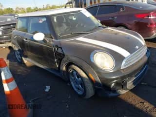2011 MINI Hardtop with VIN WMWSU3C53BT182331, listed as a IAAI auction lot 43349678 with 113,536 mi miles and . Bid and sale history available at DreamBid. Image 1.