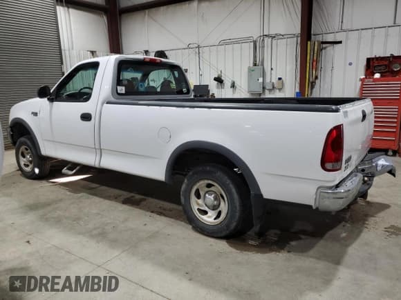 ✅ 1997 Ford F-150 • VIN: 1FTDF18W4VKD41606 • Lot: 83808524. Listed on Copart with 173,675 mi. Free auction sales archive from the USA and detailed vehicle history report at DreamBid. Image 2.