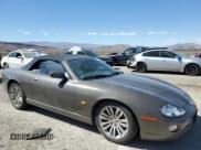 ✅ 2005 Jaguar XK XK8 • VIN: SAJDA42C452A41017 • Лот: 65583134. Опубликован ранее на Copart с пробегом 143 024 миль. Бесплатный доступ к архиву аукционных продаж из США и подробный отчёт об истории автомобиля на DreamBid. Изображение 4.