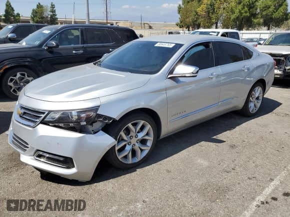 ✅ 2017 Chevrolet Impala Premier • VIN: 1G1145S37HU184220 • Lot: 80649765. Listed on Copart with 99,590 mi. Free auction sales archive from the USA and detailed vehicle history report at DreamBid. Image 1.