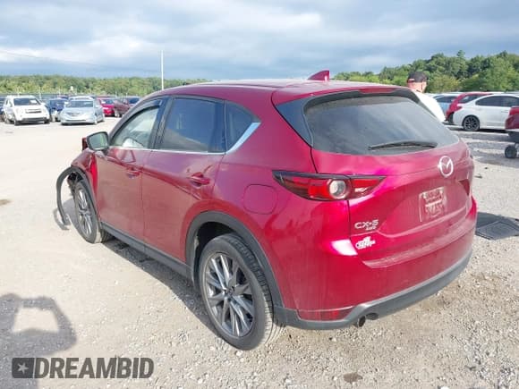✅ 2021 Mazda CX-5 Grand Touring • VIN: JM3KFBDM7M0357057 • Лот: 43110761. Опубликован ранее на IAAI с пробегом 66 576 миль. Бесплатный доступ к архиву аукционных продаж из США и подробный отчёт об истории автомобиля на DreamBid. Изображение 3.