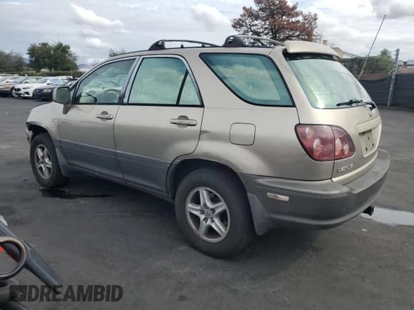 ✅ 1999 Lexus RX 300 • VIN: JT6HF10U0X0083053 • Lot: 82209945. Wystawiony na Copart z przebiegiem 184 801 mil. Bezpłatny archiwum sprzedaży aukcyjnych z USA i szczegółowy raport historii pojazdu na DreamBid. Zdjęcie 2.