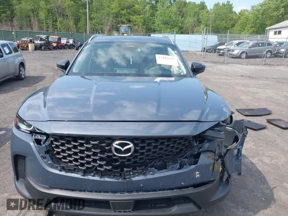 ✅ 2025 Mazda CX-50 S Premium • VIN: 7MMVABDM3SN359621 • Lot: 42402697. Listed on IAAI with 1,955 mi. Free auction sales archive from the USA and detailed vehicle history report at DreamBid. Image 12.