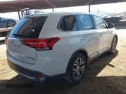 ✅ 2018 Mitsubishi Outlander SE • VIN: JA4AD3A33JZ040194 • Lot: 43240455. Listed on IAAI with 128,449 mi. Free auction sales archive from the USA and detailed vehicle history report at DreamBid. Image 4.