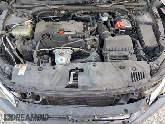 ✅ 2017 Honda Civic LX • VIN: 19XFC2F59HE017124 • Lot: 94428665. Wystawiony na Copart z przebiegiem 141 765 mil. Bezpłatny archiwum sprzedaży aukcyjnych z USA i szczegółowy raport historii pojazdu na DreamBid. Zdjęcie 11.