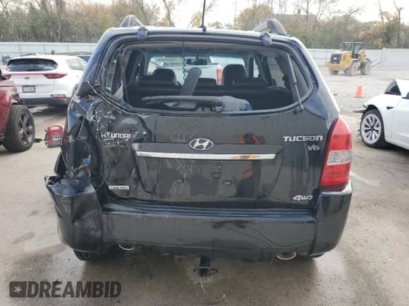 2009 Hyundai Tucson SE z VIN KM8JN72D69U974579, wystawiony jako Copart lot #76964564 z przebiegiem 98 569 mil mil oraz Nie do naprawy • Non repairable. Historia ofert i sprzedaży dostępna na DreamBid. Obrazek 6.