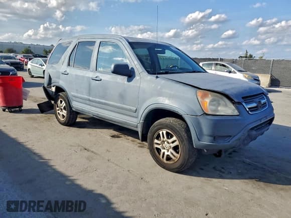 ✅ 2003 Honda CR-V EX • VIN: JHLRD788X3C042308 • Lot: 93863985. Listed on Copart with 257,495 mi. Free auction sales archive from the USA and detailed vehicle history report at DreamBid. Image 4.