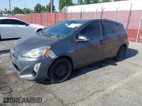 ✅ 2016 Toyota Prius One • VIN: JTDKDTB37G1132974 • Lot: 42865095. Listed on IAAI with 511,398 mi. Free auction sales archive from the USA and detailed vehicle history report at DreamBid. Image 2.