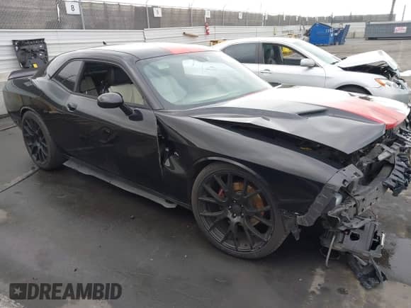 2015 Dodge Challenger R/T Plus with VIN 2C3CDZBT6FH924089, listed as a IAAI auction lot 41472696 with 87,089 mi miles and . Bid and sale history available at DreamBid. Image 1.