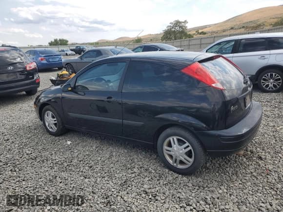 ✅ 2004 Ford Focus ZX3 • VIN: 3FAFP31344R119116 • Lot: 71017385. Listed on Copart with 73,275 mi. Free auction sales archive from the USA and detailed vehicle history report at DreamBid. Image 2.