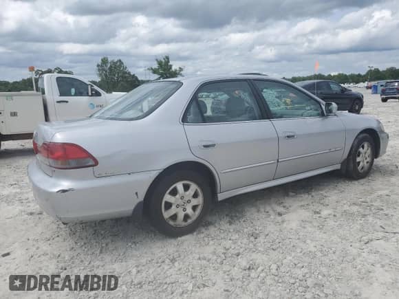 2001 Honda Accord EX с VIN 1HGCG56621A117576, выставлен на аукционе Copart как лот 59602775 с пробегом Не указан миль и Списание • Salvage title. История ставок и продаж доступна на DreamBid. Изображение 3.