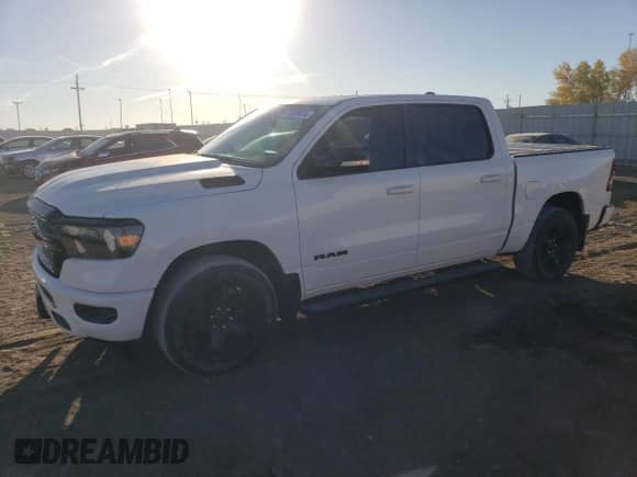 2021 Ram 1500 Big Horn with VIN 1C6SRFFM4MN688628, listed as a Copart auction lot 75939474 with 30,825 mi miles and Salvage title. Bid and sale history available at DreamBid. Image 1.