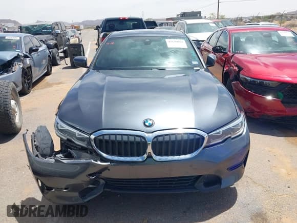 ✅ 2020 BMW 3 Series 330i • VIN: 3MW5R1J07L8B25648 • Lot: 42130052. Listed on IAAI with 64,662 mi. Free auction sales archive from the USA and detailed vehicle history report at DreamBid. Image 12.