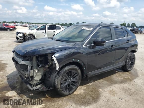 ✅ 2022 Mitsubishi Eclipse Cross LE • VIN: JA4ASVAA9NZ013183 • Lot: 61331965. Listed on Copart with 60,879 mi. Free auction sales archive from the USA and detailed vehicle history report at DreamBid. Image 1.