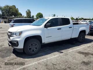 ✅ 2021 Chevrolet Colorado 4WD Z71 • VIN: 1GCGTDEN5M1238797 • Лот: 66071325. Опубликован ранее на Copart с пробегом 27 604 миль. Бесплатный доступ к архиву аукционных продаж из США и подробный отчёт об истории автомобиля на DreamBid. Изображение 1.