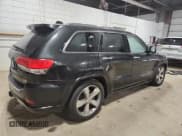 ✅ 2014 Jeep Grand Cherokee Overland • VIN: 1C4RJFCG9EC339863 • Lot: 90741315. Listed on Copart with 143,485 mi. Free auction sales archive from the USA and detailed vehicle history report at DreamBid. Image 3.