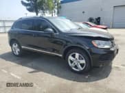 ✅ 2013 Volkswagen Touareg Lux • VIN: WVGEF9BP8DD005928 • Lot: 65650085. Listed on Copart with 111,843 mi. Free auction sales archive from the USA and detailed vehicle history report at DreamBid. Image 4.