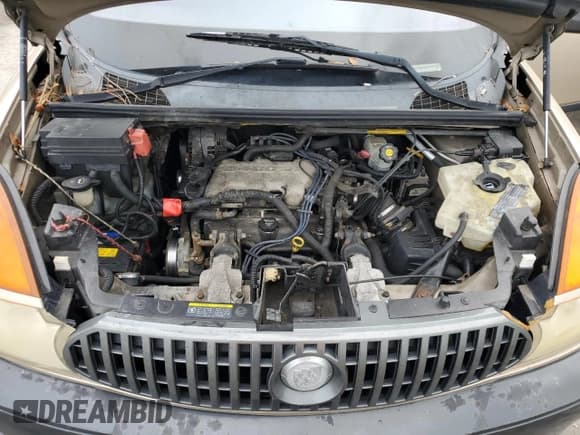 ✅ 2003 Buick Rendezvous CX • VIN: 3G5DA03E93S511202 • Лот: 81291915. Опубликован ранее на Copart с пробегом Не указан. Бесплатный доступ к архиву аукционных продаж из США и подробный отчёт об истории автомобиля на DreamBid. Изображение 12.