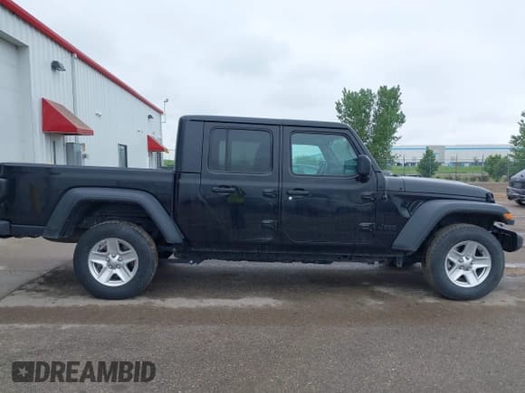 ✅ 2023 Jeep Gladiator Sport S • VIN: 1C6HJTAG8PL522548 • Лот: 42278010. Опубликован ранее на IAAI с пробегом 58 491 миль. Бесплатный доступ к архиву аукционных продаж из США и подробный отчёт об истории автомобиля на DreamBid. Изображение 13.