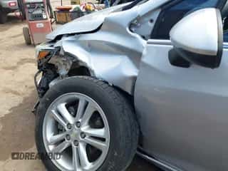 2017 Chevrolet Cruze LT z VIN 1G1BE5SM1H7257414, wystawiony jako IAAI lot #43180998 z przebiegiem 103 728 mil mil oraz . Historia ofert i sprzedaży dostępna na DreamBid. Obrazek 6.