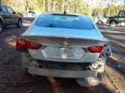 ✅ 2017 Chevrolet Malibu LS • VIN: 1G1ZB5STXHF194883 • Lot: 43582481. Listed on IAAI with 107,181 mi. Free auction sales archive from the USA and detailed vehicle history report at DreamBid. Image 16.