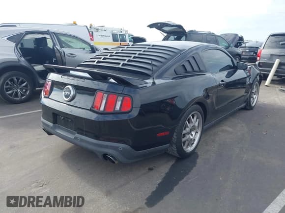 ✅ 2012 Ford Mustang GT Premium • VIN: 1ZVBP8CF1C5281488 • Lot: 43796307. Listed on IAAI with 91,501 mi. Free auction sales archive from the USA and detailed vehicle history report at DreamBid. Image 4.