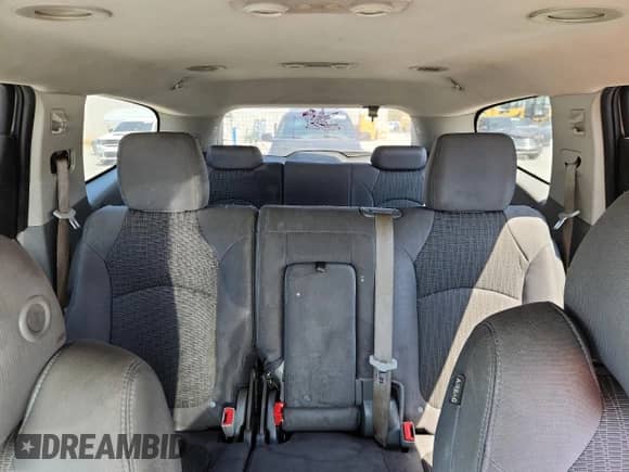 2013 Chevrolet Traverse LS с VIN 1GNKRFKD2DJ129432, выставлен на аукционе Copart как лот 80570435 с пробегом 203 660 миль миль и Списание • Salvage title. История ставок и продаж доступна на DreamBid. Изображение 10.
