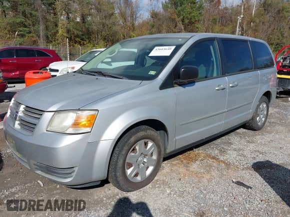 2009 Dodge Grand Caravan SE with VIN 1D8HN44E19B505419, listed as a IAAI auction lot 43603640 with 208,062 mi miles and . Bid and sale history available at DreamBid. Image 2.