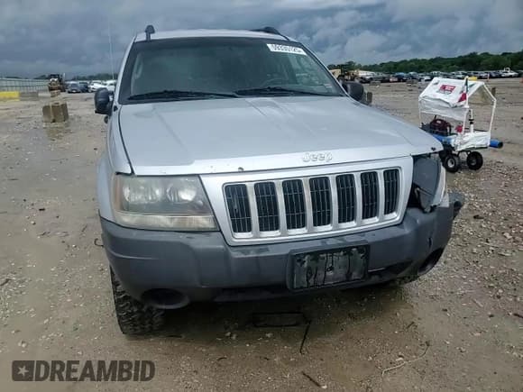 ✅ 2004 Jeep Grand Cherokee Laredo • VIN: 1J4GW48S64C140353 • Lot: 59335125. Listed on Copart with 131,847 mi. Free auction sales archive from the USA and detailed vehicle history report at DreamBid. Image 14.