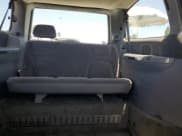 ✅ 2000 Dodge Caravan SE • VIN: 1B4GP44R0YB528936 • Lot: 64148625. Listed on Copart with 84,596 mi. Free auction sales archive from the USA and detailed vehicle history report at DreamBid. Image 10.