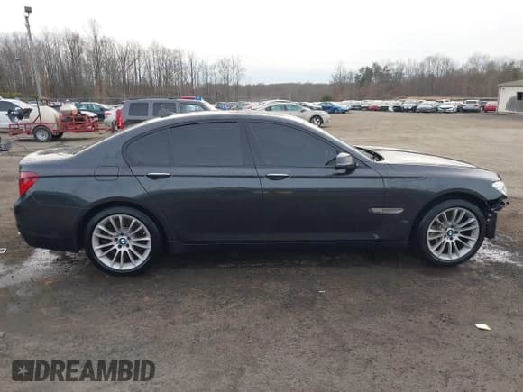 ✅ 2015 BMW 7 Series 750i xDrive • VIN: WBAYB6C56FG299238 • Lot: 41441393. Listed on IAAI with 62,396 mi. Free auction sales archive from the USA and detailed vehicle history report at DreamBid. Image 14.