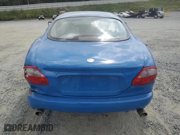 ✅ 1998 Jaguar XK • VIN: SAJJGAED3AR025857 • Lot: 84219455. Listed on Copart with Not provided. Free auction sales archive from the USA and detailed vehicle history report at DreamBid. Image 6.