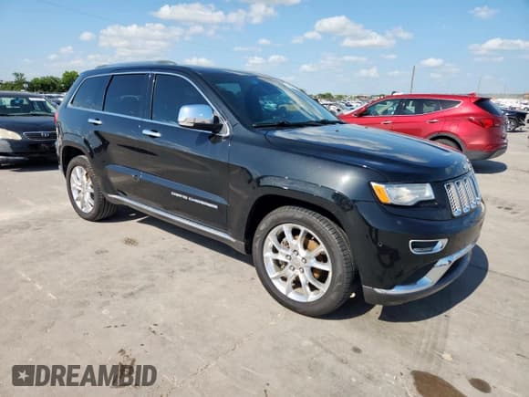 ✅ 2014 Jeep Grand Cherokee • VIN: 1C4RJEJMXEC585632 • Lot: 62036515. Listed on Copart with 148,660 mi. Free auction sales archive from the USA and detailed vehicle history report at DreamBid. Image 4.