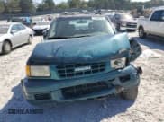 ✅ 1999 Isuzu Rodeo S • VIN: 4S2CM58W4X4330190 • Lot: 81996975. Wystawiony na Copart z przebiegiem 167 032 mil. Bezpłatny archiwum sprzedaży aukcyjnych z USA i szczegółowy raport historii pojazdu na DreamBid. Zdjęcie 5.