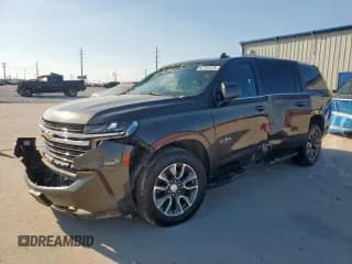 ✅ 2021 Chevrolet Suburban LT • VIN: 1GNSCCKD4MR174227 • Lot: 82164525. Listed on Copart with 99,717 mi. Free auction sales archive from the USA and detailed vehicle history report at DreamBid. Image 1.