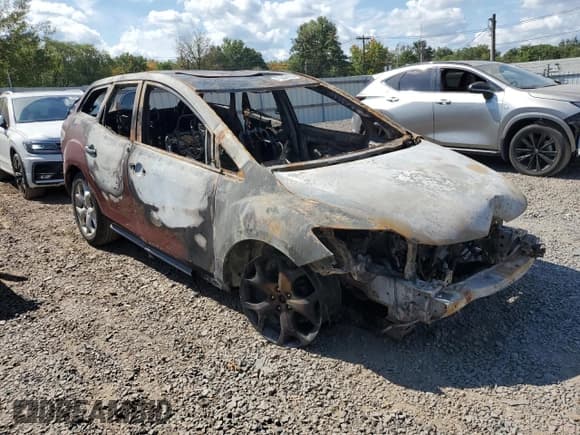 ✅ 2011 Mazda CX-7 S Grand Touring • VIN: JM3ER4DL7B0358746 • Лот: 71259195. Опубликован ранее на Copart с пробегом Не указан. Бесплатный доступ к архиву аукционных продаж из США и подробный отчёт об истории автомобиля на DreamBid. Изображение 4.