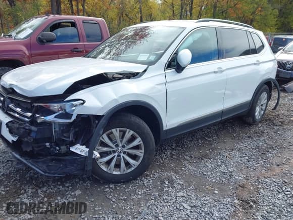 ✅ 2018 Volkswagen Tiguan SEL • VIN: 3VV2B7AX4JM071743 • Лот: 43466984. Опубликован ранее на IAAI с пробегом 90 095 миль. Бесплатный доступ к архиву аукционных продаж из США и подробный отчёт об истории автомобиля на DreamBid. Изображение 2.