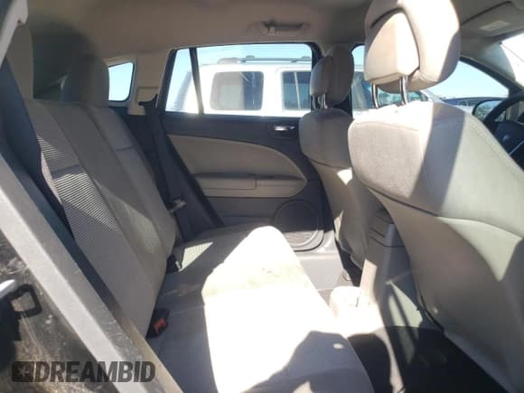 ✅ 2012 Dodge Caliber SXT • VIN: 1C3CDWDA1CD515405 • Лот: 87036844. Опубликован ранее на Copart с пробегом 197 976 миль. Бесплатный доступ к архиву аукционных продаж из США и подробный отчёт об истории автомобиля на DreamBid. Изображение 11.